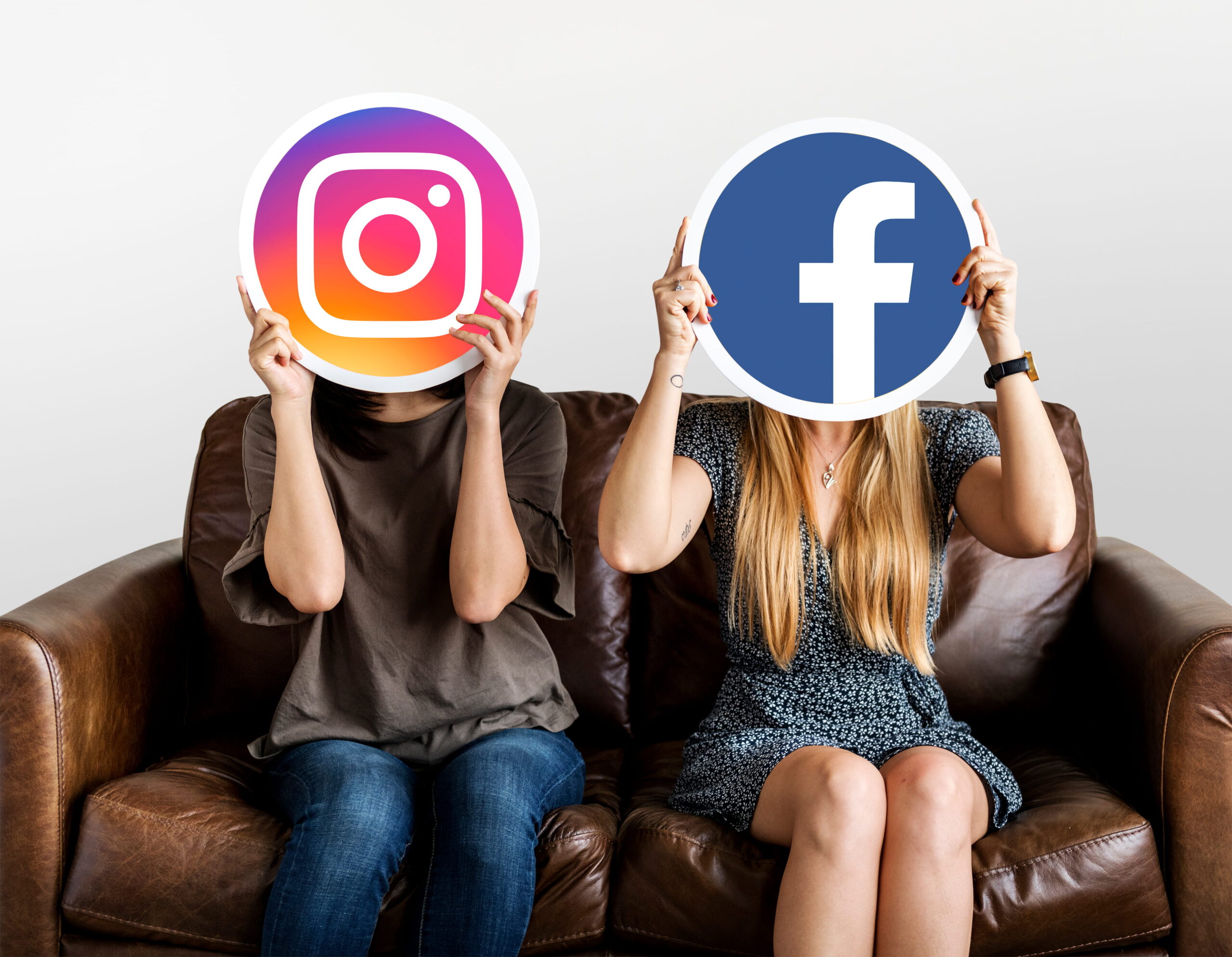 people-holding-social-media-icons (1)